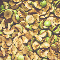 The process of home cooking dried fruits in an electric dryer.