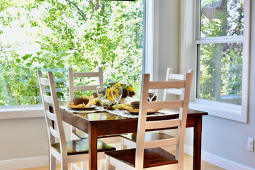 Autumn Thanksgiving table decor and place settings for festive family dinner, home life interior background. Copy space, house and home background, living