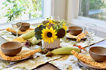Autumn Thanksgiving table decor and place settings for festive family dinner, home life interior background. Copy space, house and home background, living