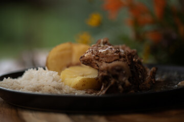 meat with potato called barbecue, traditional Mexican dish