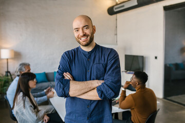 Portrait of a cheerful young businessman in the office