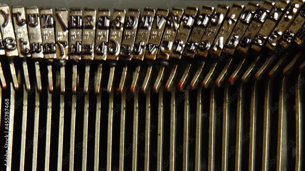 Poster mechanism of a retro typewriter. old typewriter hammers. close up.