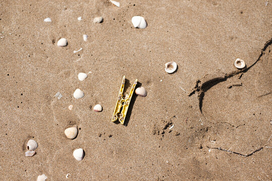 plastic trash on the beach sand