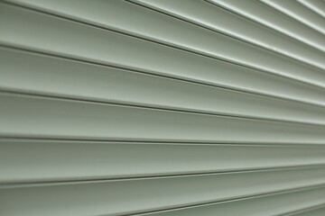 Obraz premium Blinds texture on the street. Plastic surface covering the windows.