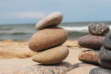 A pile of stones stacked on the beach