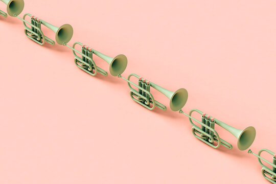 Green trumpets on pink background