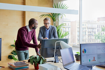 Businessmen discussing a project