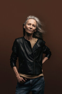 Portrait of a senior woman with grey long hair 