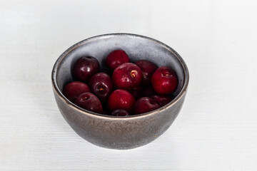 Fresh ripe cherries in a cup. Healthy eating. Vegetarian breakfast. Dessert.
