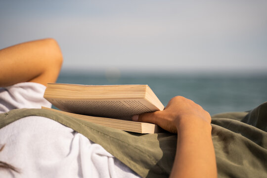 Beautiful young woman relaxing at beach
