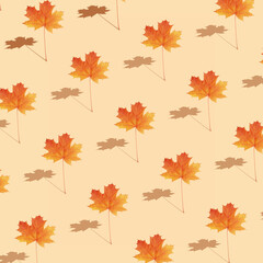 Pattern autumn maple leaf orange-red on orange background