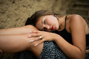 cheerful young girl spending good time at the beach. Beauty portrait. Сute teenage girl or woman on the beach nature landscape fresh air beach. Natural beauty. lifestyle/ real people/ funny/ dance.