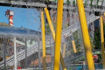 steel construction of a water slide at the Vienna Prater park with water pouring down