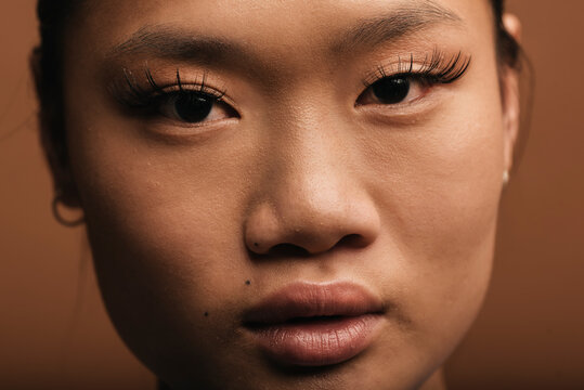 Pretty Asian Woman in Studio Close Up