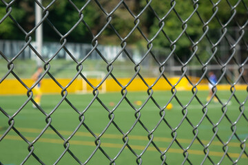 Fototapeta premium Handrails in Front of a Soccer Field in Medellin, Colombia