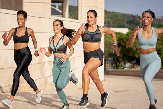 Sportive running women. - Powered by Adobe