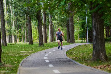 Marathon runner training in the park