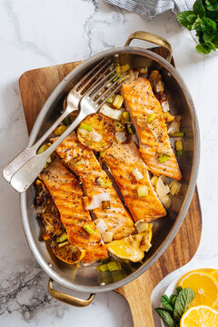 Top view of pan with grilled salmon 