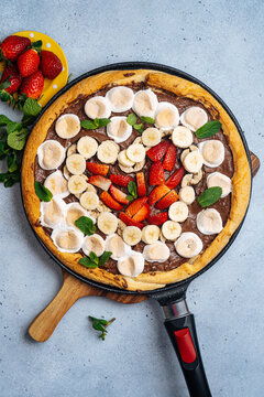 Pan with sweet pizza