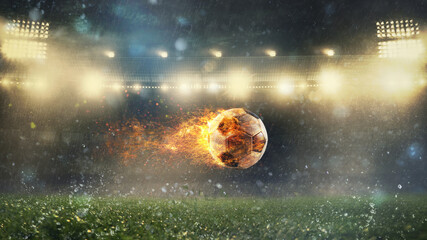 Close up of a fiery soccer ball kicked with power at the stadium