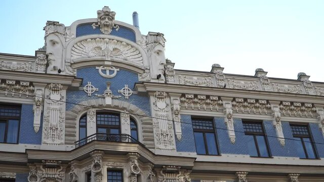 One of the famous facade exterior design samples of Art Nouveau historical architecture in Europe, Riga town, Latvia. This architectural style is also known as Jugendstil.