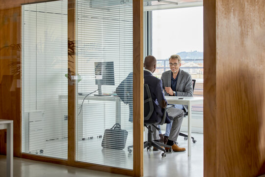 Two business colleagues meeting