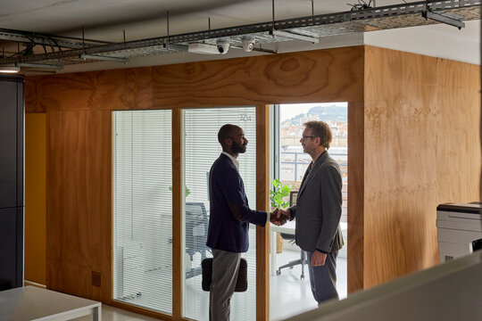 Businessman greeting his partner