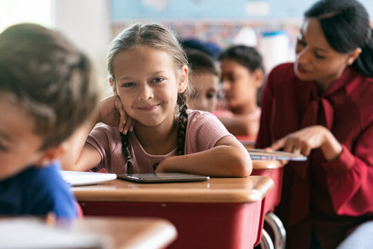 School: Cheerful Student Looking At Camera
