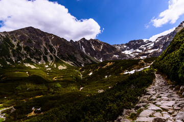 Fototapeta na wymiar Tatra mountain during summer time. Gasienicowy Pond surrounding