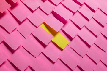 Pink Post it reminders with Yellow post it in centre
