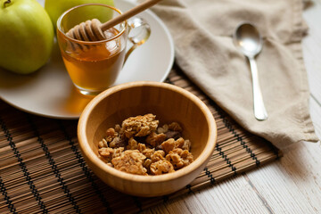 Eat the day with a healthy breakfast of honey muesli and apples