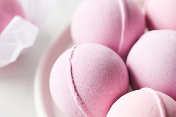 Pink bath bombs on plate