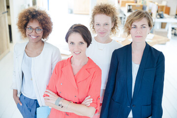 Portrait of women smiling in office