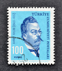 Cancelled Postage stamp printed in Turkey shows portrait of writer Ahmet Rasim (1863-1932), circa...