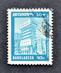 Cancelled postage stamp printed by angladesh, that shows Fenchuganj Fertiliser Factory, circa 1978.
