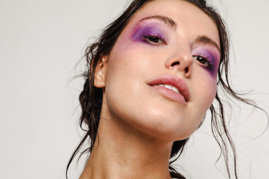 Beautiful Woman With Purple Makeup On 