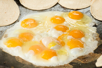 Mexican food, fried eggs on the comal