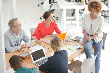 Fototapeta premium Office workers having meeting at desk