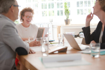 Office workers having meeting at desk