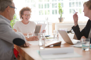 Office workers having meeting at desk