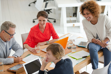 Fototapeta premium Office workers having meeting at desk
