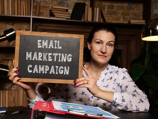 Financial concept about EMAIL MARKETING CAMPAIGN with sign on the chalkboard
