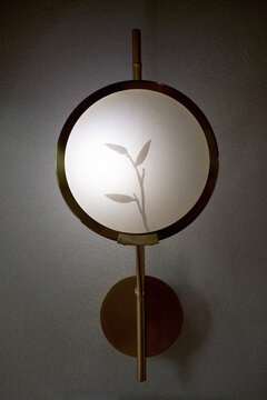 Closeup circular design wall lamp, indoors