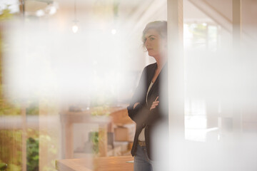 Portrait of young woman smiling at office