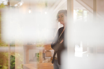 Portrait of young woman smiling at office