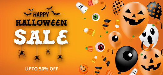 Happy Halloween sale banner with balloons and candy.