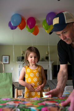 3rd Birthday Party - Girl's Dad Helps her with Presents