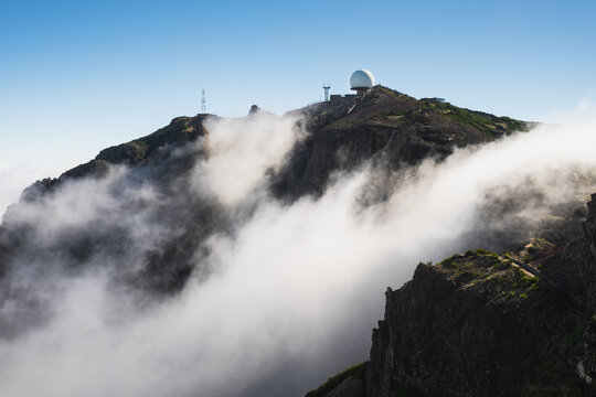 View Of The Air Radar Station Above Clouds On The Peak Of The Mountain