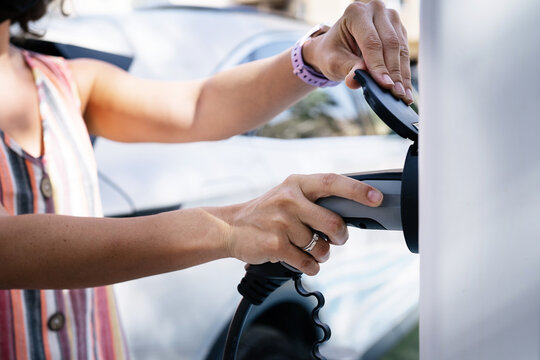 Charging Electric Car, power charger on a electric parking
