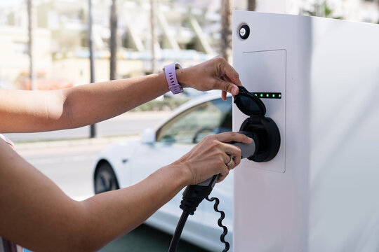 Charging Electric Car in city